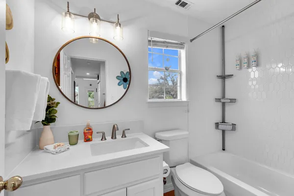 a utility room with closet dryer and washer