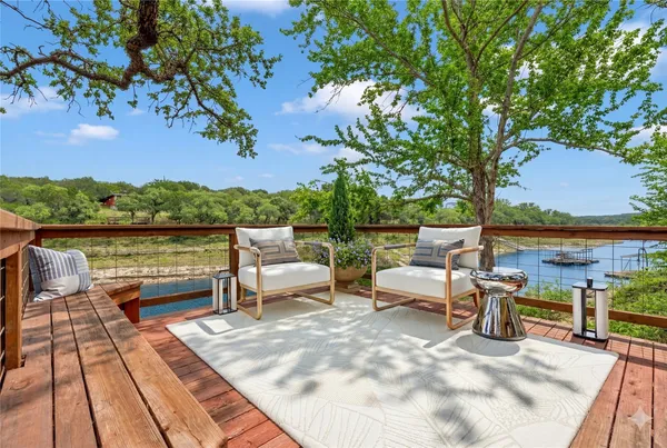 a view of roof deck with patio