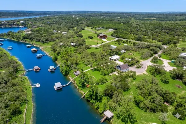 a view of a terrace with couches and city view