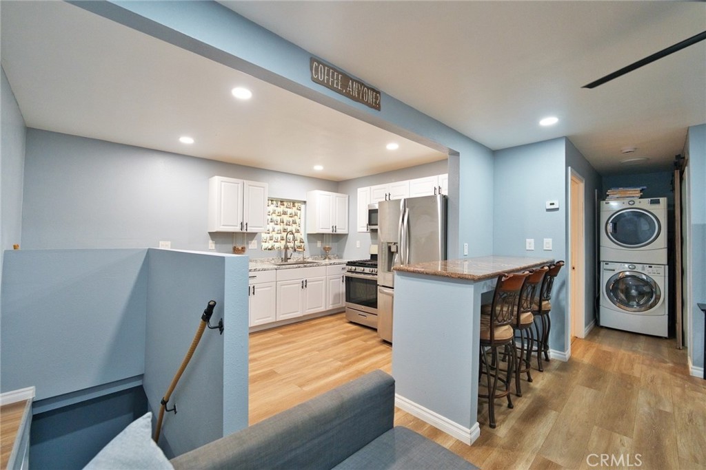 29083 Hook Creek Road Cedar Glen, CA 92321 - Photo 12 of 50 a kitchen with refrigerator and cabinets