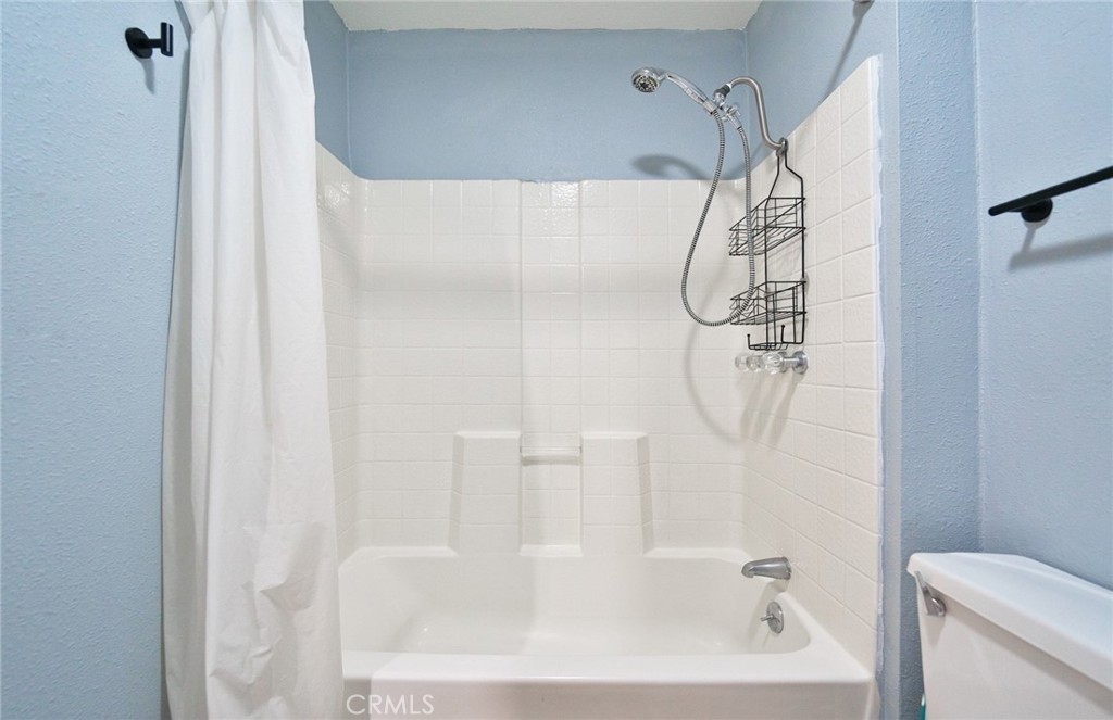 29083 Hook Creek Road Cedar Glen, CA 92321 - Photo 18 of 50 a bathroom with a shower and a glass door