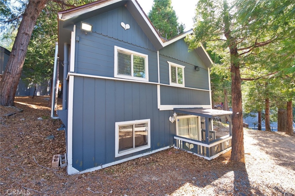 29083 Hook Creek Road Cedar Glen, CA 92321 - Photo 2 of 50 a view of house with outdoor space and porch