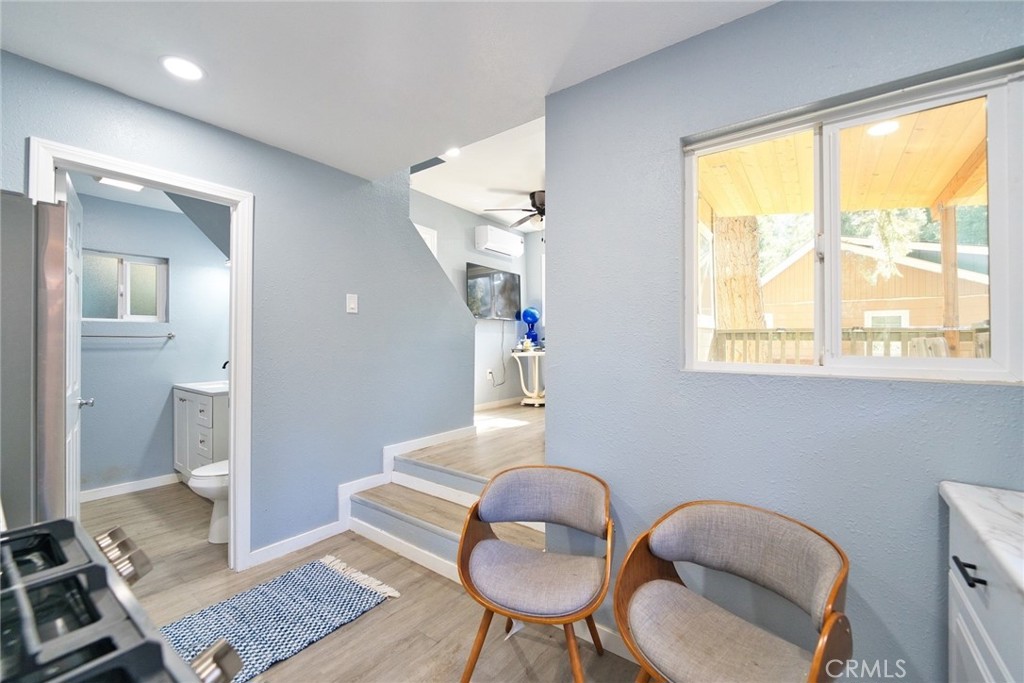 29083 Hook Creek Road Cedar Glen, CA 92321 - Photo 30 of 50 a living room with furniture and a window