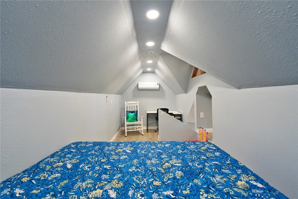 29083 Hook Creek Road Cedar Glen, CA 92321 - Photo 35 of 50 a bedroom with bed and window