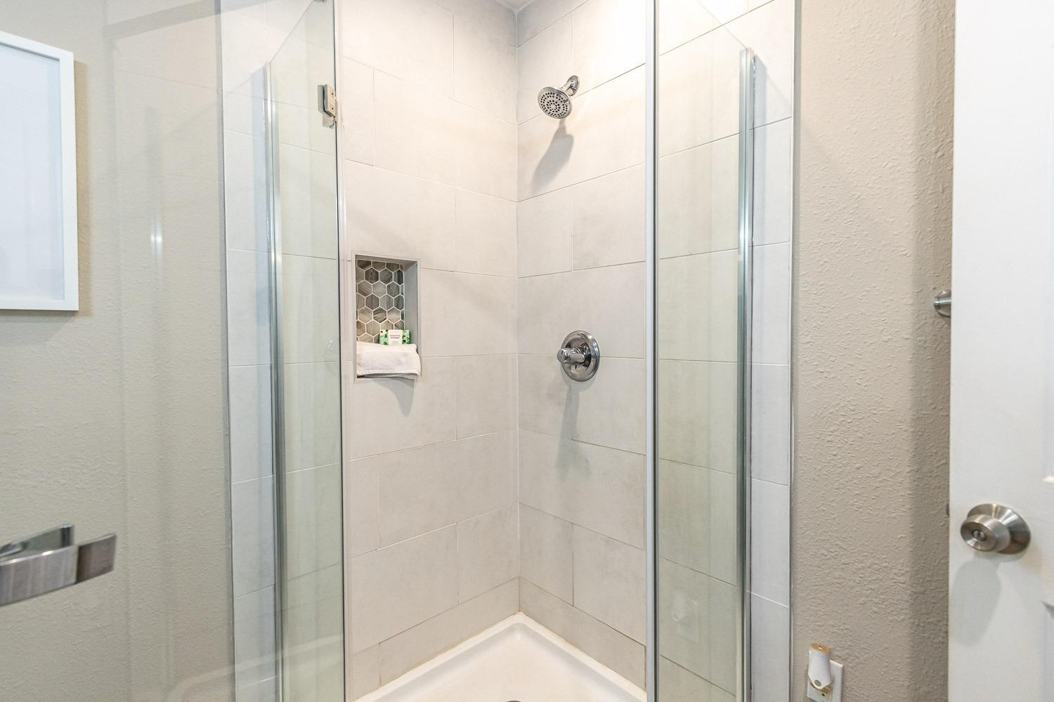5221 14th Street Lubbock, TX 79416 - Photo 19 of 34 a bathroom with a shower