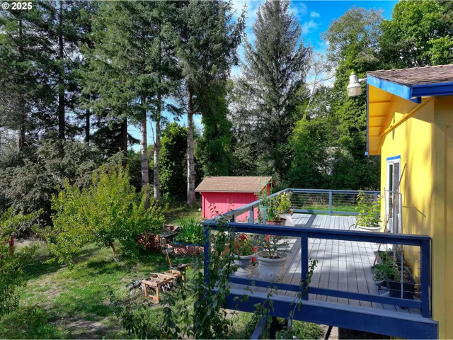 a view of a small yard from a balcony