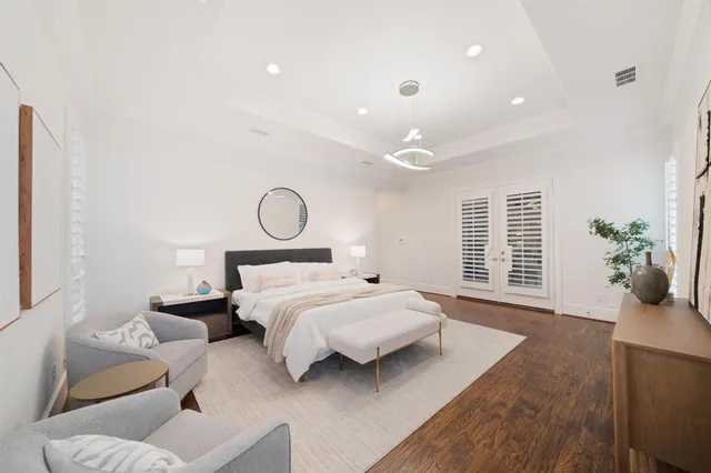 a bed room with a bed and a window