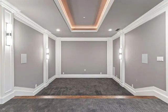 a kitchen with stainless steel appliances granite countertop a sink a stove and cabinets