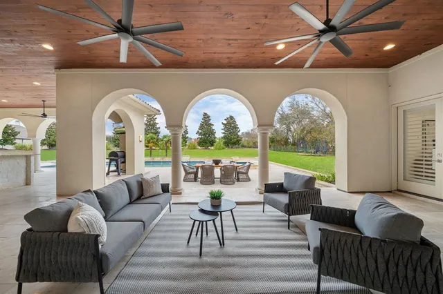 a kitchen with stainless steel appliances granite countertop a sink and a stove