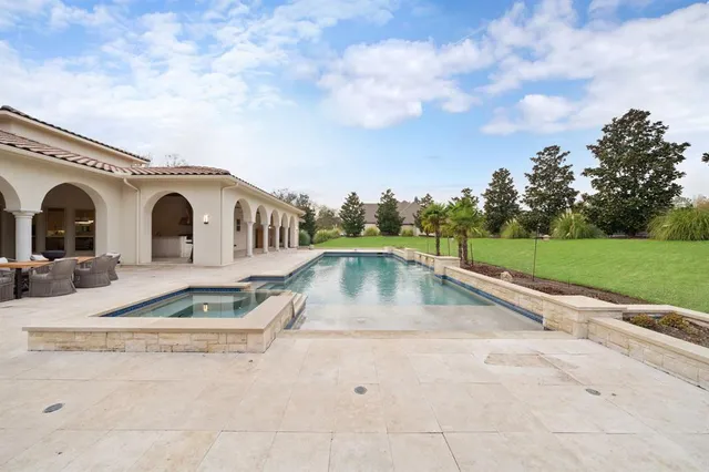 a view of a lake with a yard