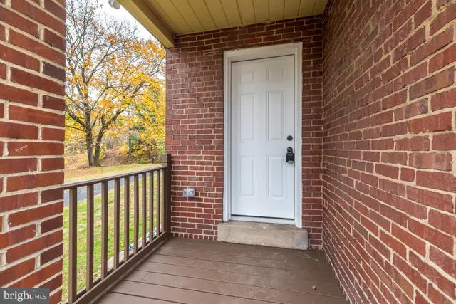a view of a brick house with a door