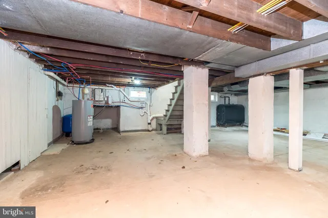 a view of a room with wooden walls