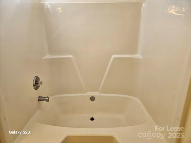 a bathroom with a tub