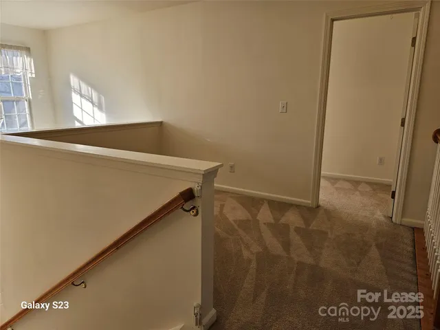a front view of a house with wooden floor