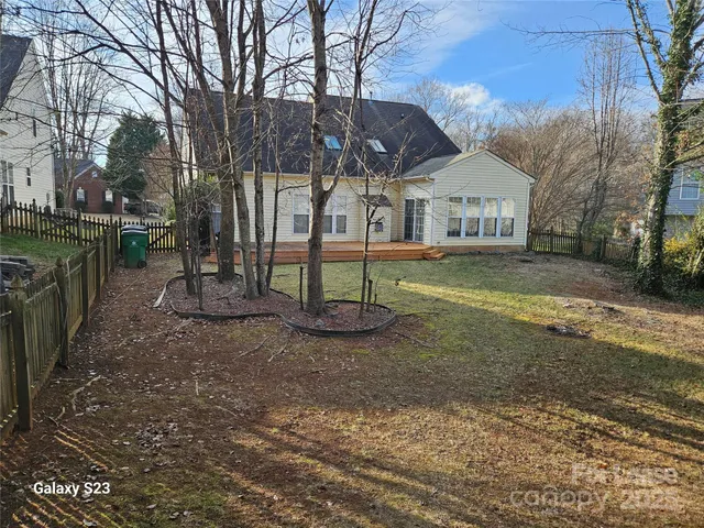 a view of outdoor space with wooden floor