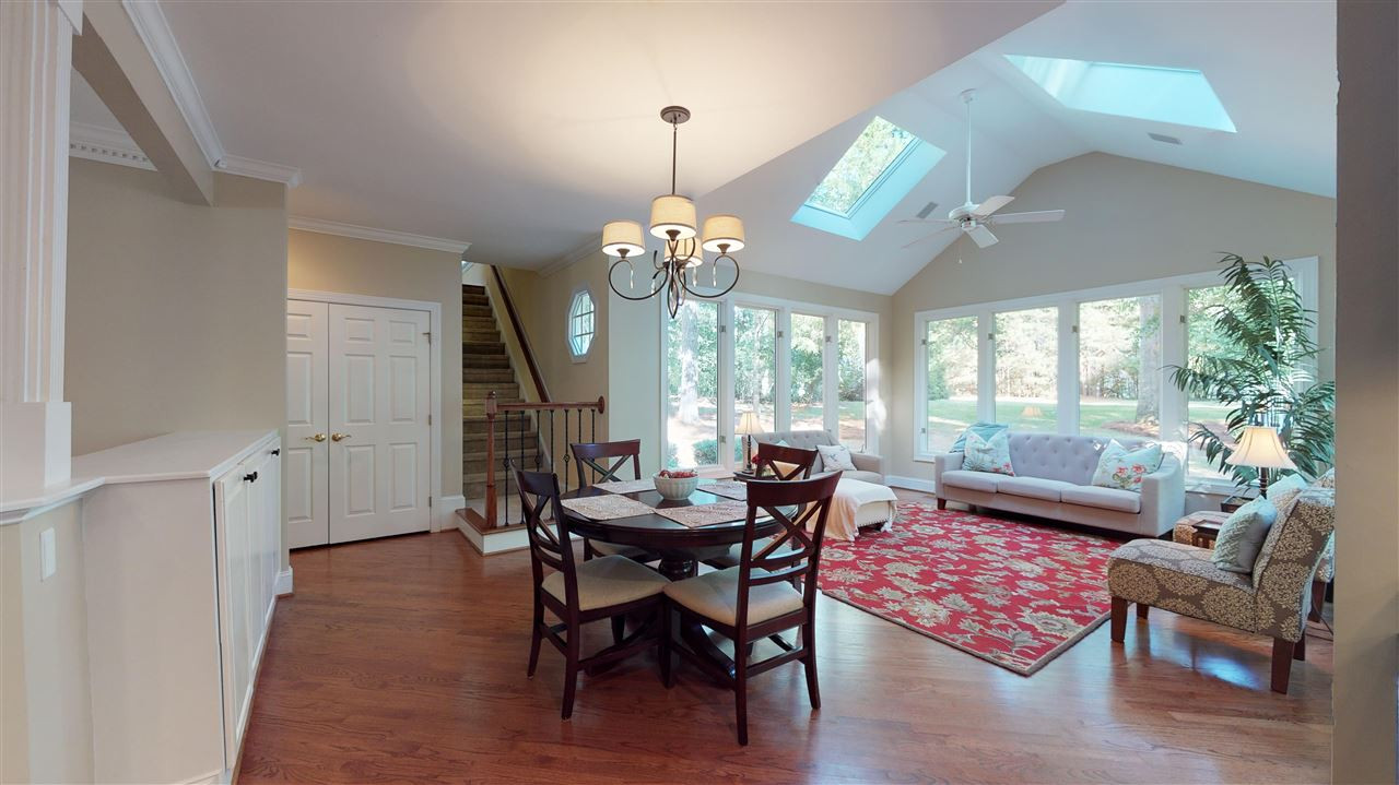 3132 Cranesbill Drive Raleigh, NC 27613 - Photo 13 of 30 The breakfast area offers a great view of the sunroom and beyond! Breakfast Area