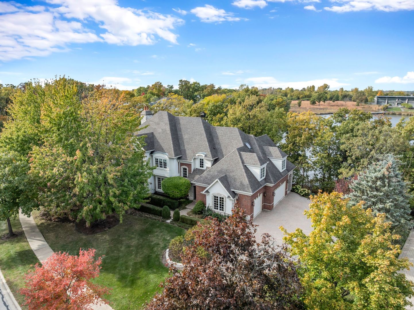 817 Lakeview Lane Burr Ridge, IL 60527 - Photo 3 of 69 an aerial view of a house with a garden and lake view