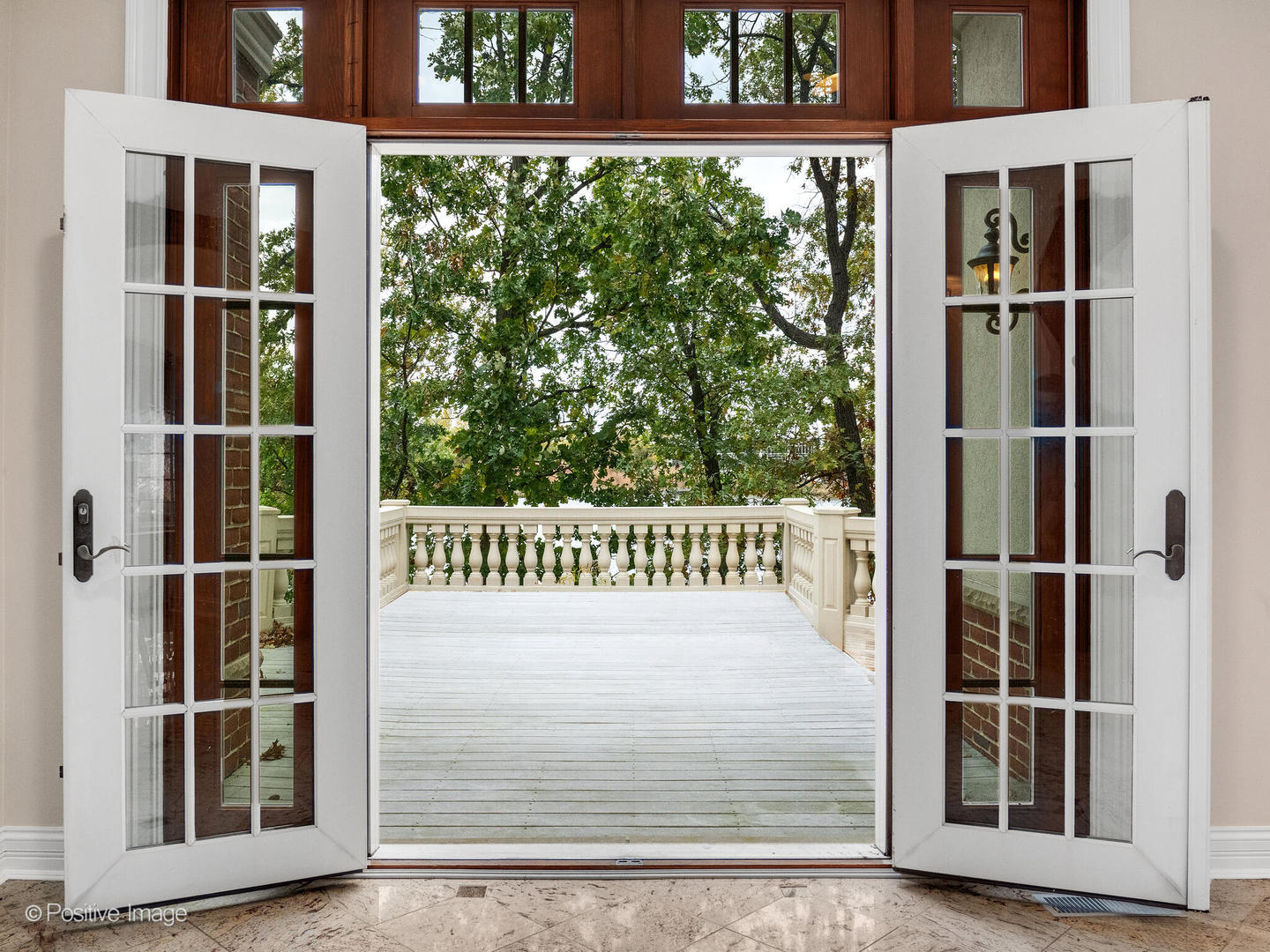 817 Lakeview Lane Burr Ridge, IL 60527 - Photo 32 of 69 a view of a balcony with a window and front door
