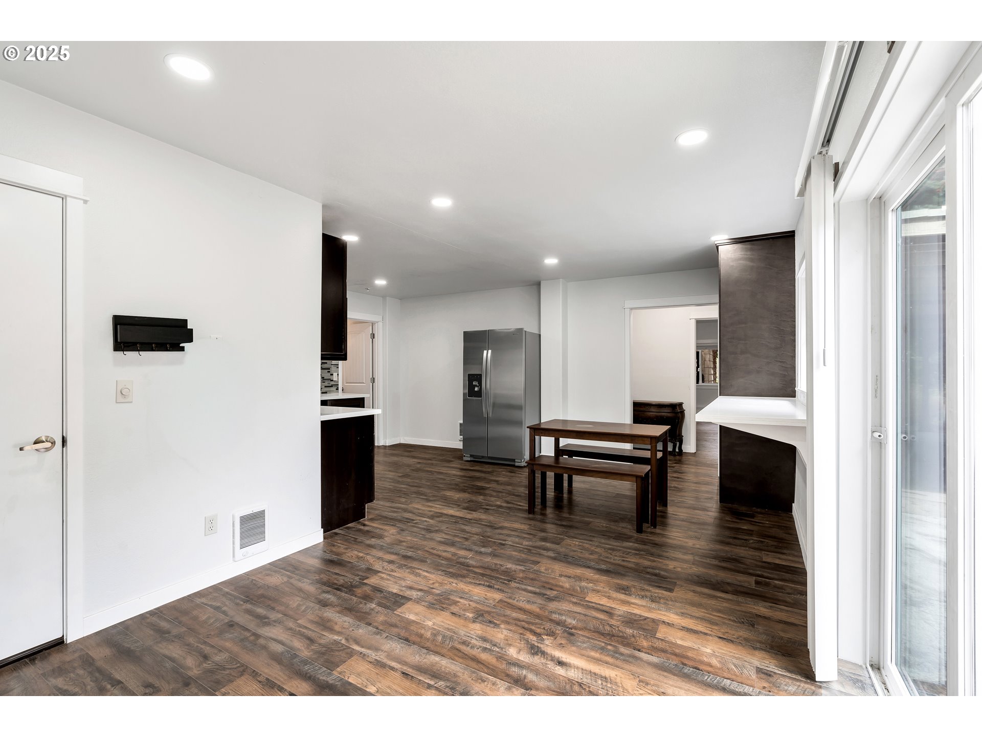 8451 Southeast Bush Street Portland, OR 97266 - Photo 21 of 47 a view of living room with furniture and a window