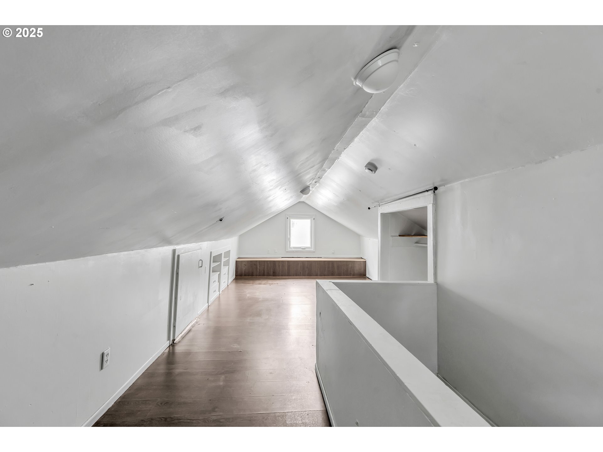 8451 Southeast Bush Street Portland, OR 97266 - Photo 29 of 47 a view of entryway and hall with wooden floor