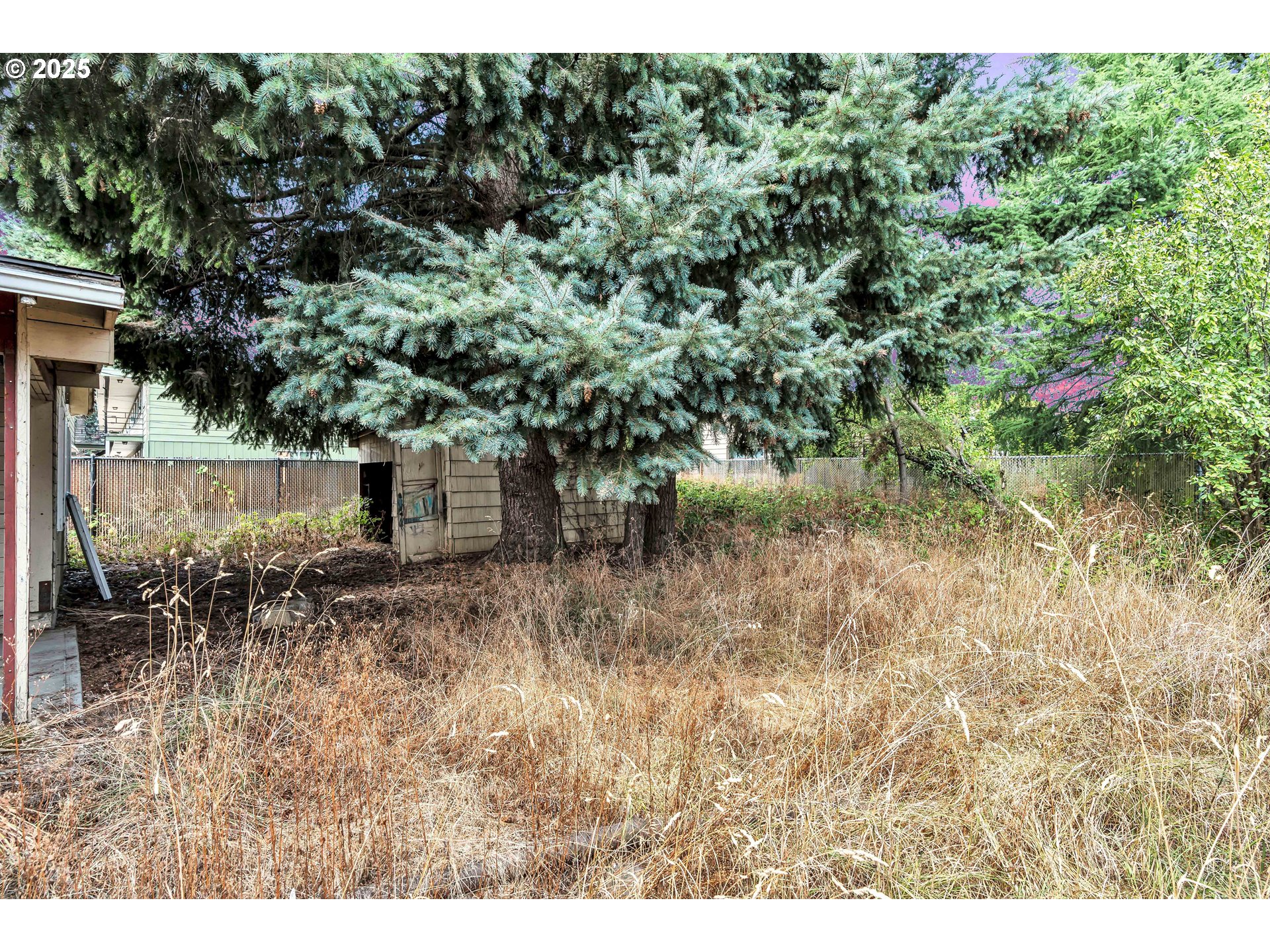 8451 Southeast Bush Street Portland, OR 97266 - Photo 35 of 47 a view of a backyard