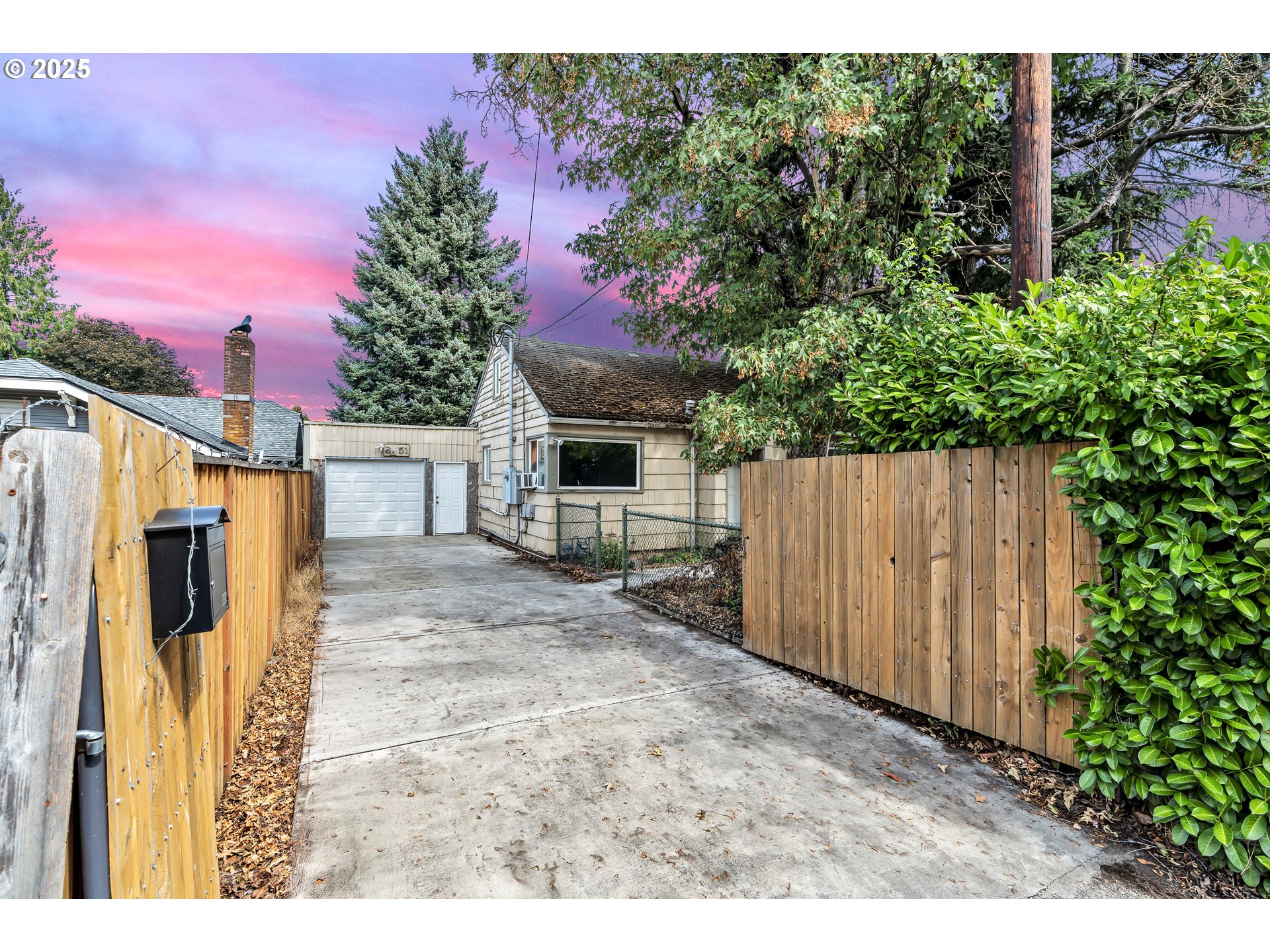 8451 Southeast Bush Street Portland, OR 97266 - Photo 40 of 47 a view of a house with backyard and sitting area