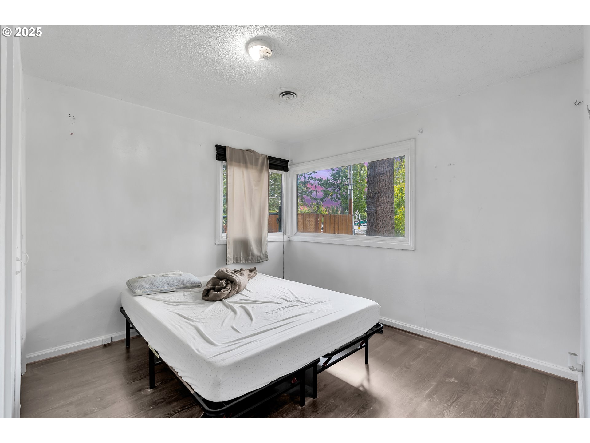 8451 Southeast Bush Street Portland, OR 97266 - Photo 10 of 47 a white cabinet with table and white cabinet
