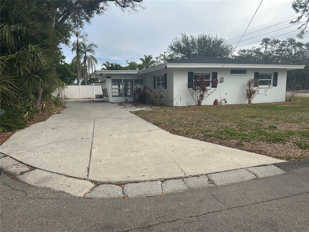 3553 Center Circle Largo, FL 33774 - Photo 1 of 1 a view of a house with backyard space