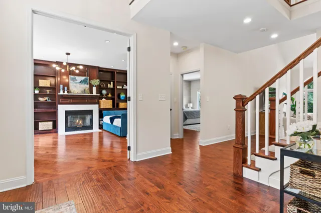 a view of living room with furniture and a chandelier