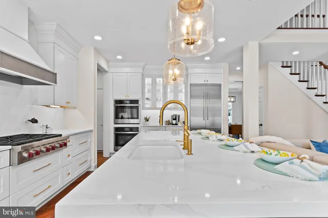 a bedroom with a bed and a night stand