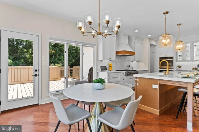 a spacious bedroom with a large bed and a couch