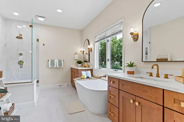 a bedroom with a bed and flowerpot