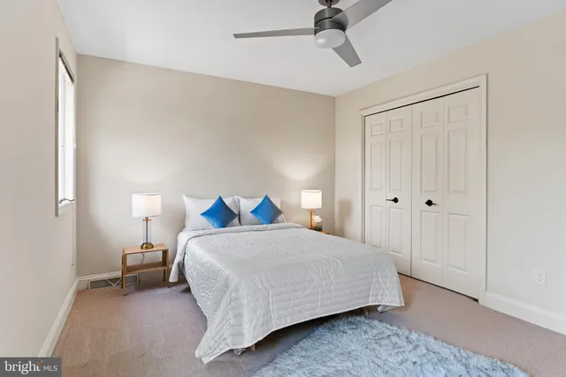 a kitchen with stainless steel appliances kitchen island granite countertop a refrigerator and a stove top oven