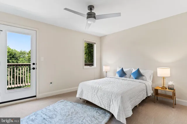 a kitchen with stainless steel appliances kitchen island a sink and cabinets