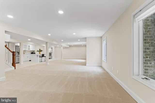 a view of a room with chairs and tables