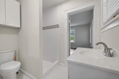 a bathroom with a sink and a toilet
