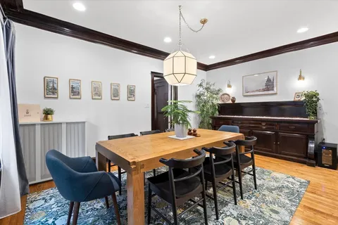 a kitchen with stainless steel appliances and granite countertop wooden cabinets