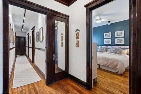 a view of a bedroom from a hallway