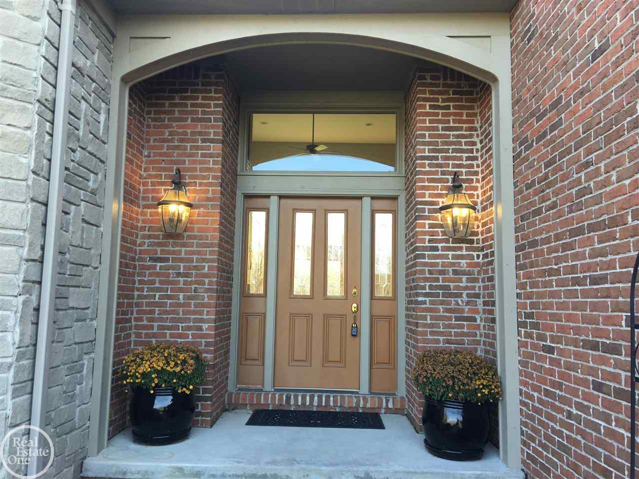 4213 Hosner Road Metamora, MI 48455 - Photo 10 of 57 Front entry Stone accents and brick detail