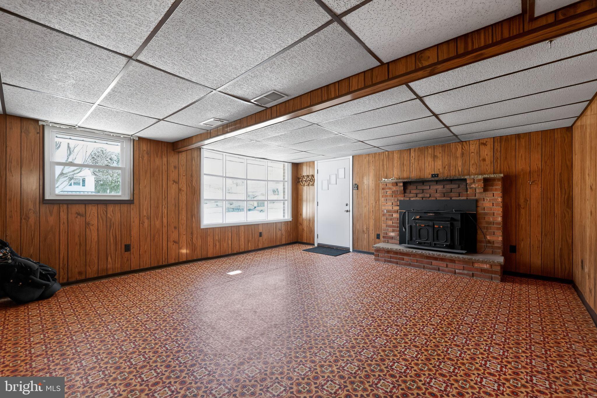 205 Willard Road Hatboro, PA 19040 - Photo 17 of 30 a view of an empty room with a fireplace