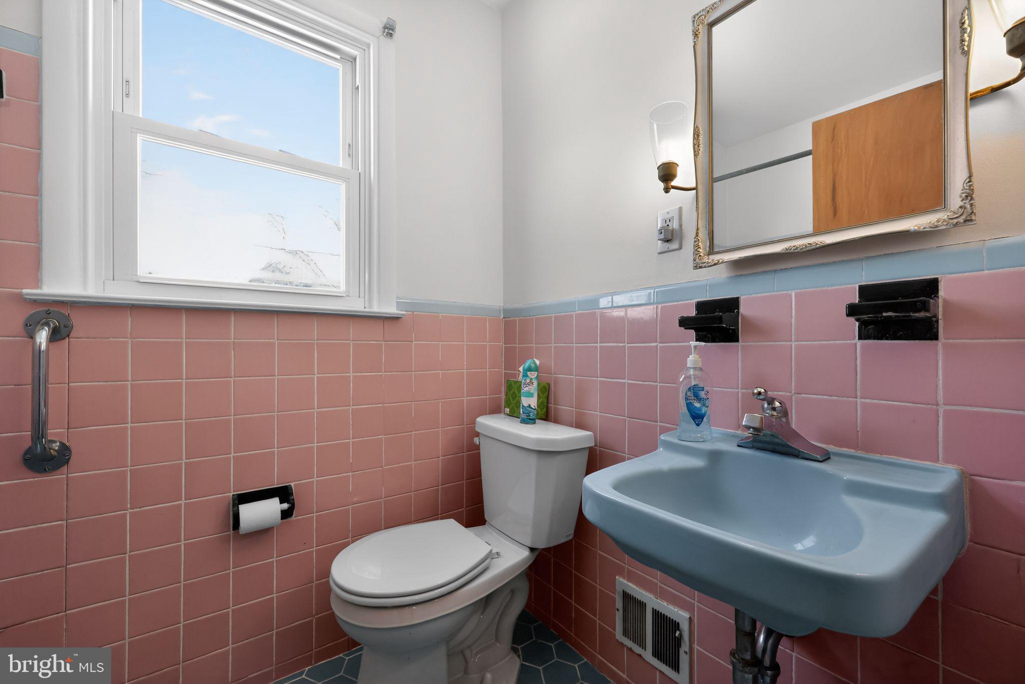 205 Willard Road Hatboro, PA 19040 - Photo 21 of 30 a bathroom with a sink a toilet and mirror