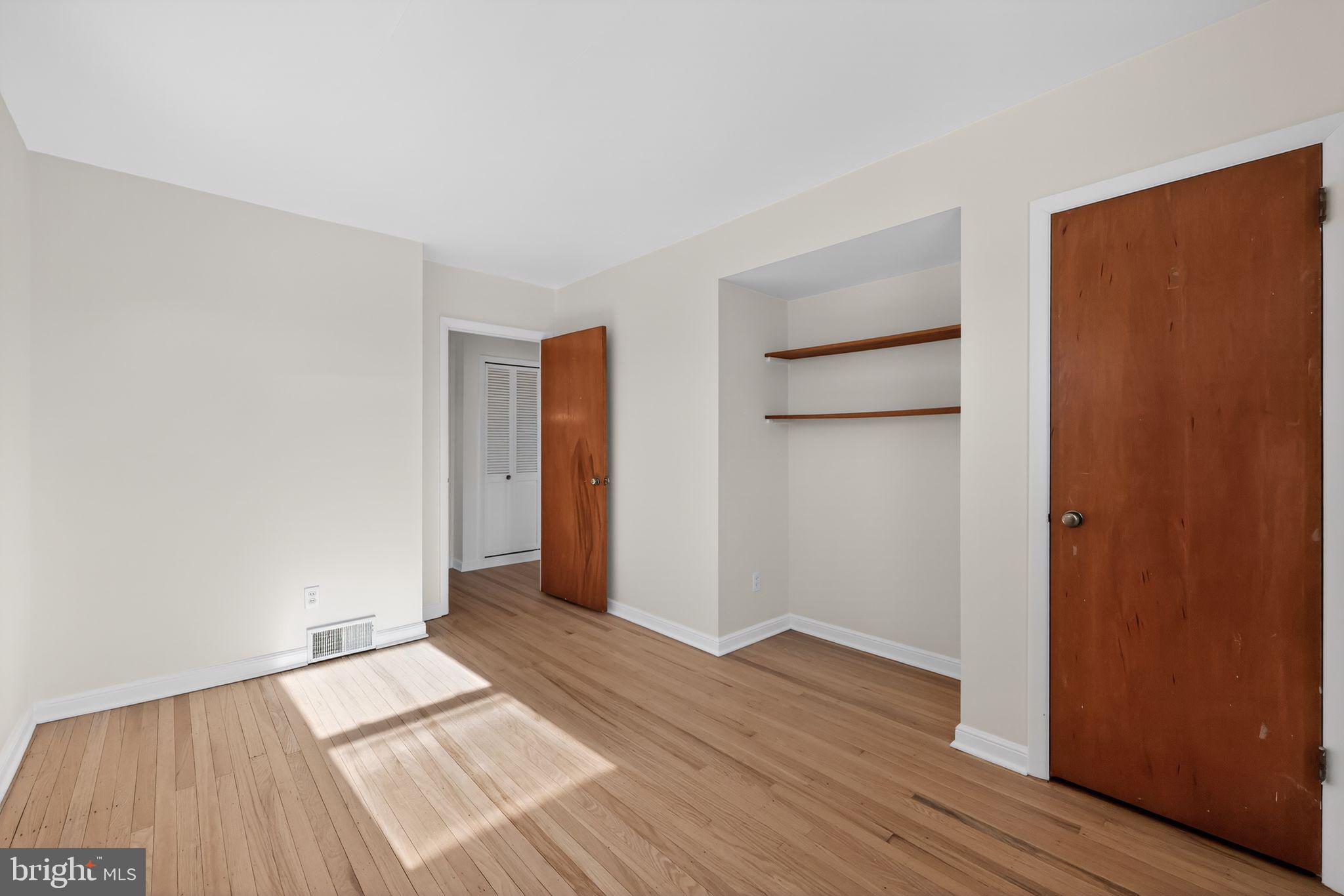 205 Willard Road Hatboro, PA 19040 - Photo 23 of 30 an empty room with wooden floor and closet