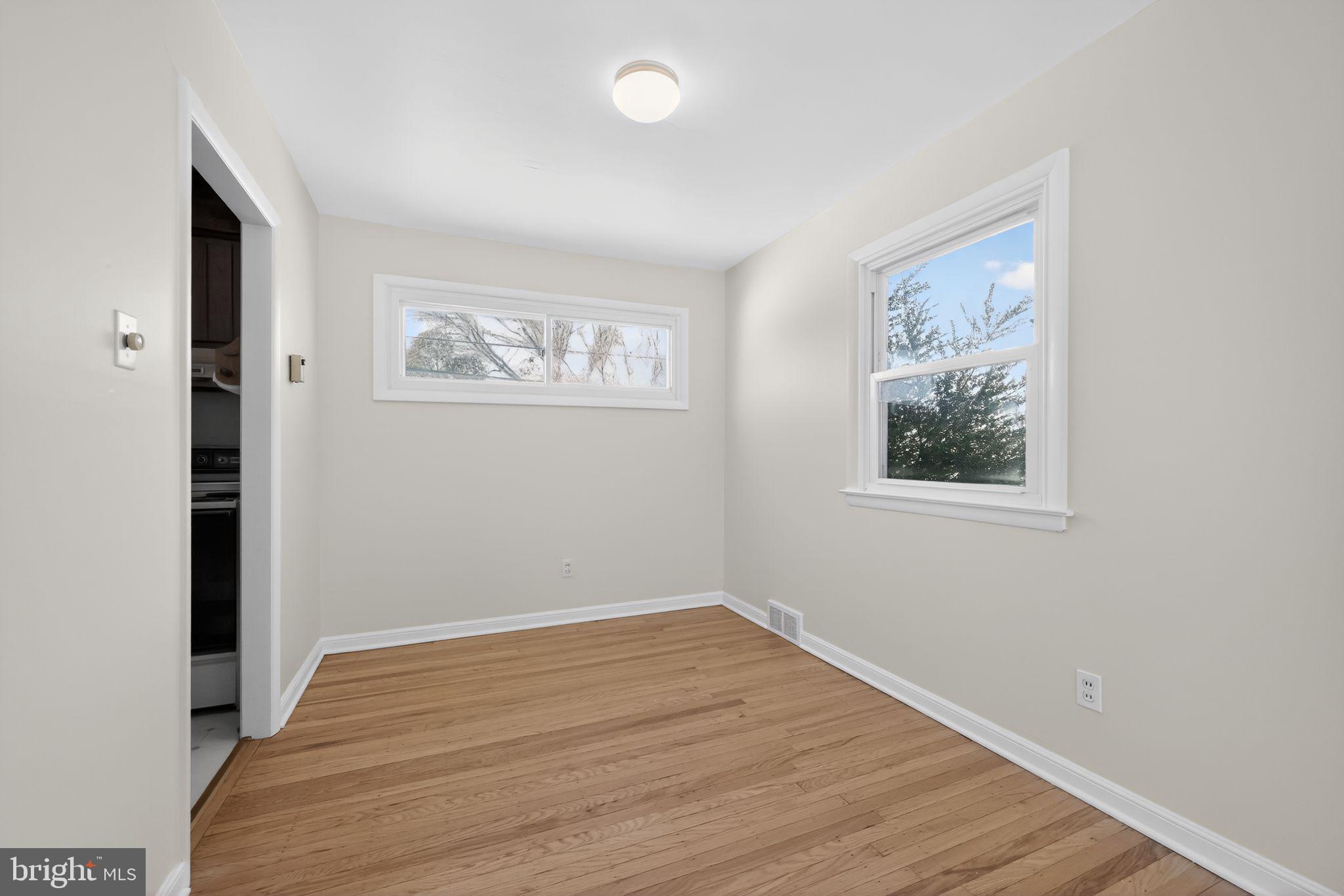 205 Willard Road Hatboro, PA 19040 - Photo 6 of 30 a view of a room with wooden floor and window