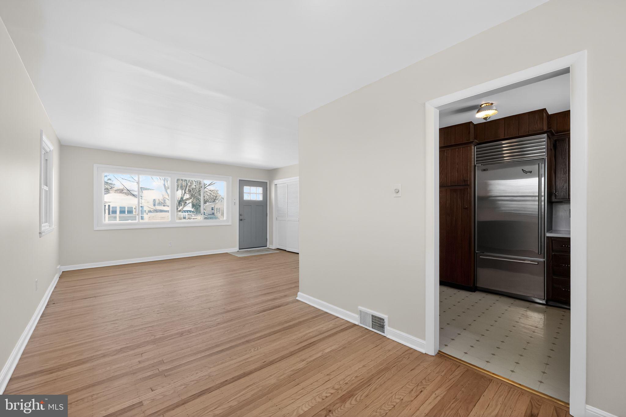 205 Willard Road Hatboro, PA 19040 - Photo 10 of 30 an empty room with wooden floor closet and windows