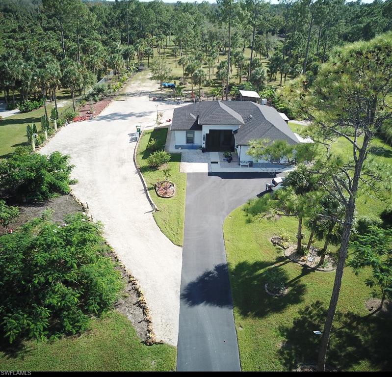 3486 40th Avenue Southeast Naples, FL 34117 - Photo 2 of 50 an aerial view of a house with outdoor space