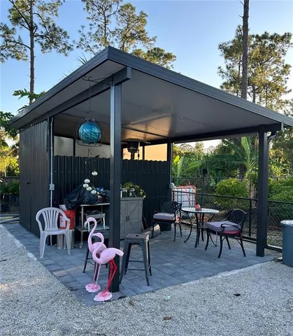 a view of a wooden floor with a fire pit