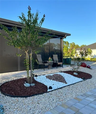 a vase of flowers sitting on a table