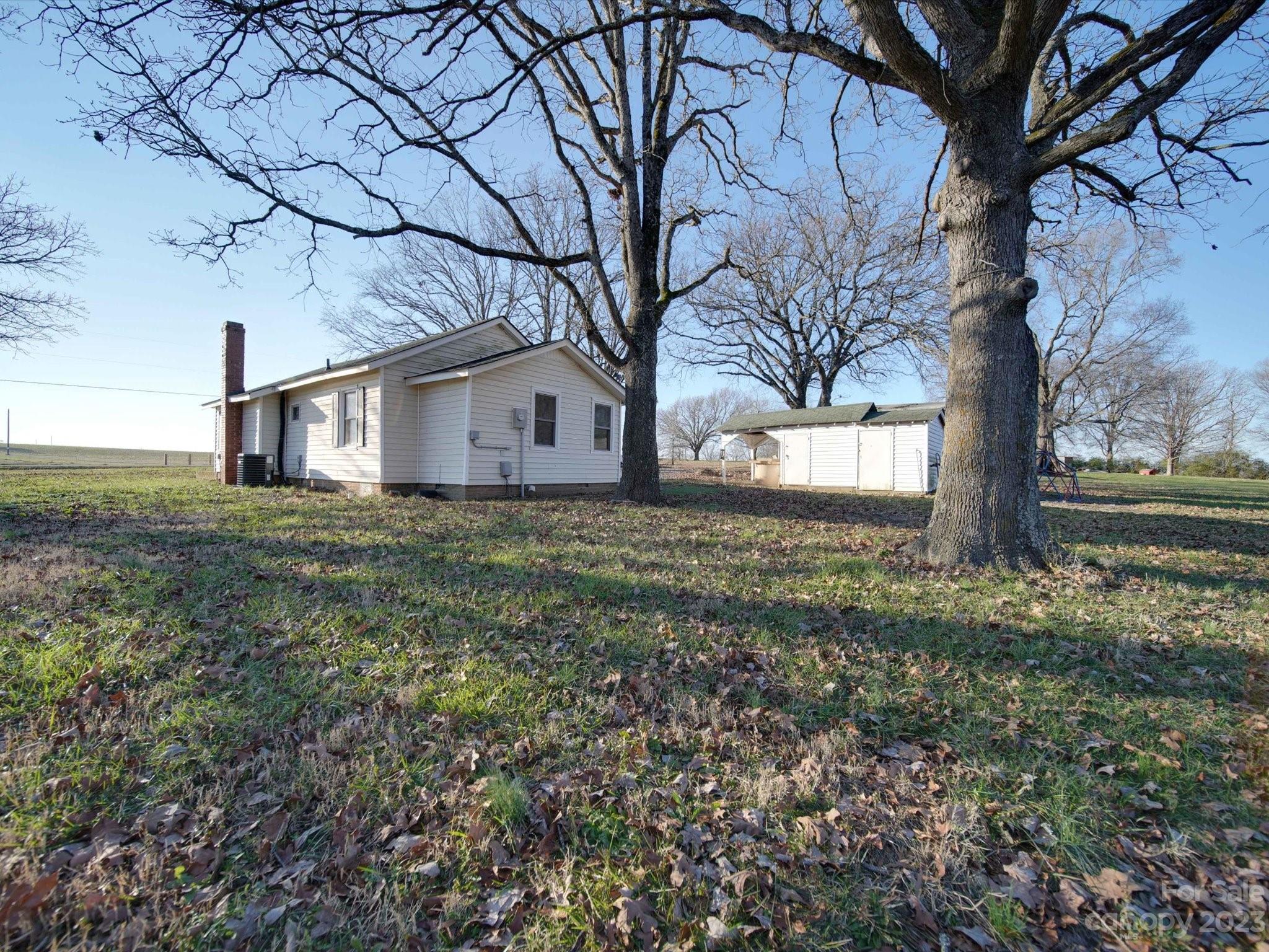 3319 Stack Road Monroe, NC 28112 - Photo 15 of 45 a view of a house with a yard
