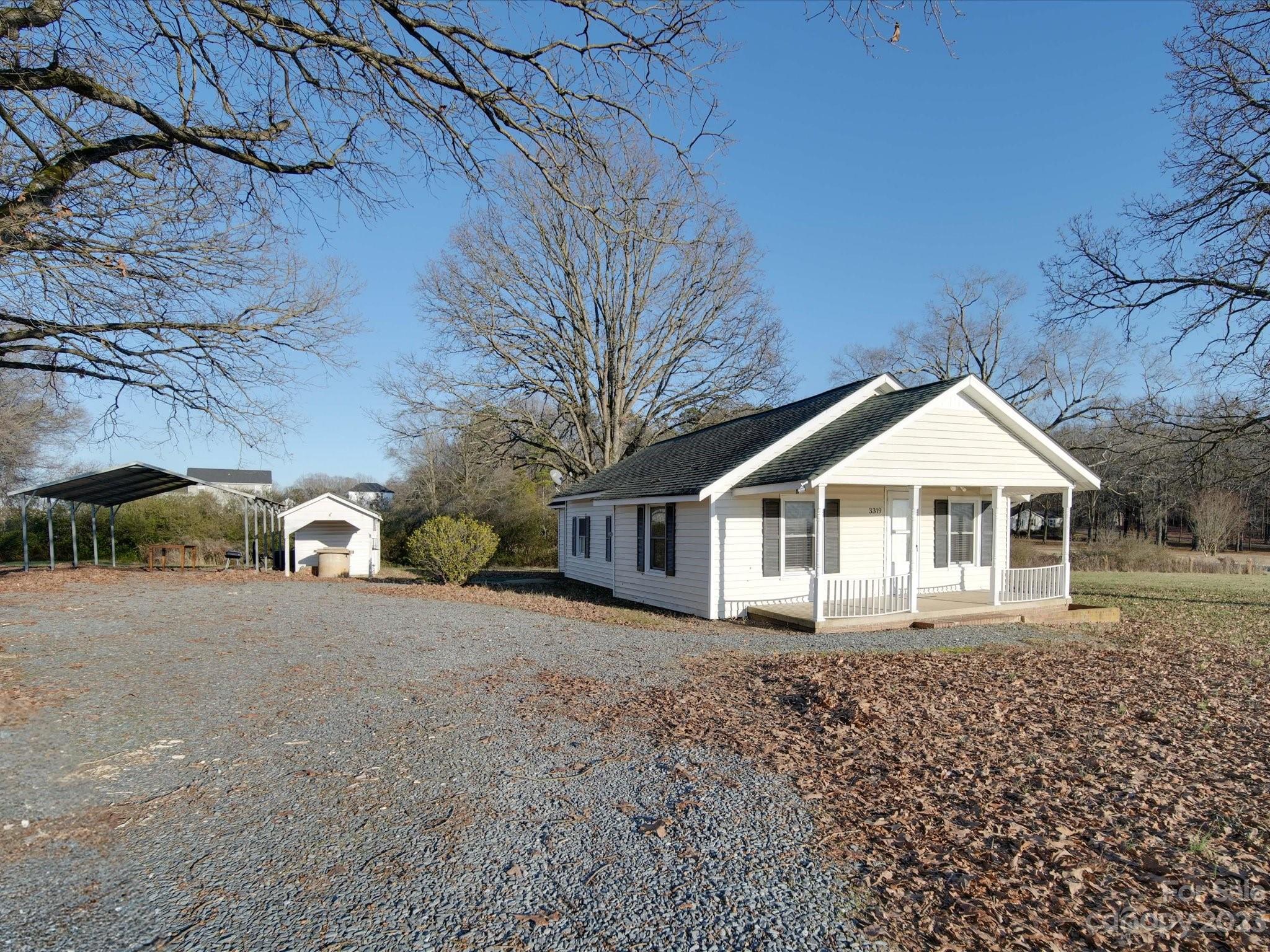 3319 Stack Road Monroe, NC 28112 - Photo 2 of 45 front view of a house with a yard