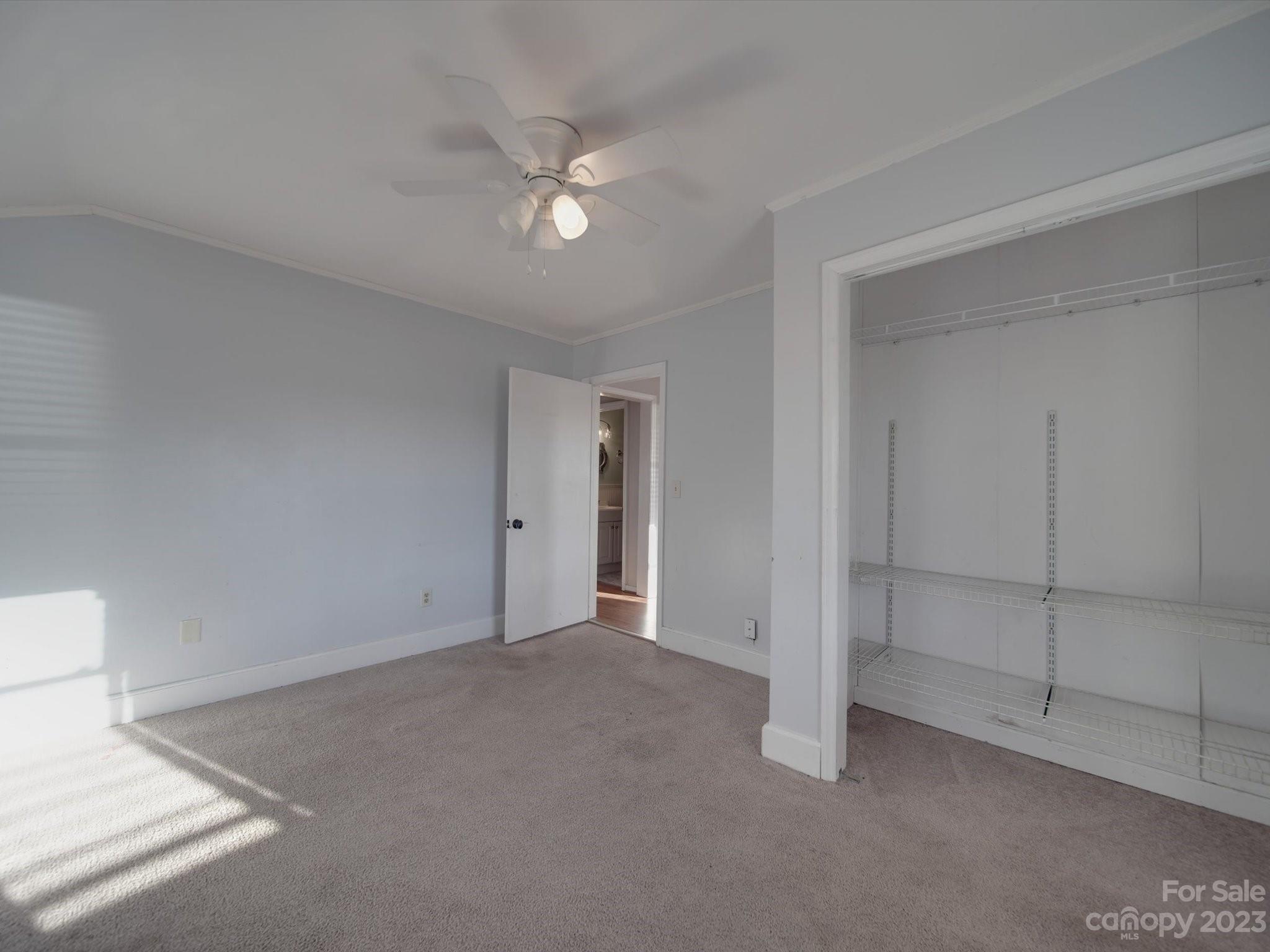 3319 Stack Road Monroe, NC 28112 - Photo 34 of 45 a view of an empty room with a fan